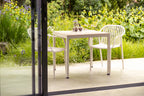 California Chairs with Speckled Beige Tables