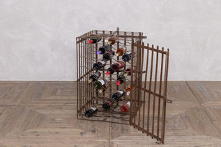 antique-iron-wine-rack-filled