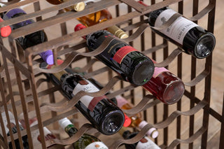 antique-iron-wine-rack-filled