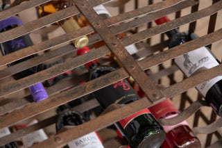 antique-iron-wine-rack-filled