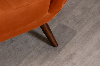 orange-velvet-accent-chair-leg
