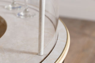 edge of glass shelf of vintage home bar unit