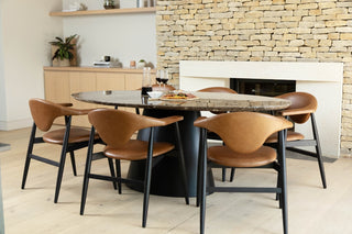 bexley-oval-dining-table-brown-lifestyle
