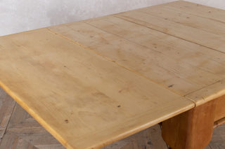 close up of extended pine table