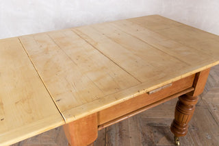 close up of extended pine table