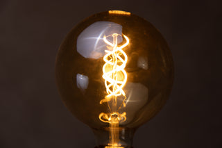 Vela Free Standing Light in Antique Brass - SECONDS ITEM