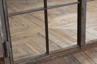 close up of cast iron mirrored window