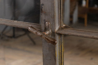 close up of cast iron mirrored window handle