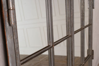 close up of cast iron mirrored window