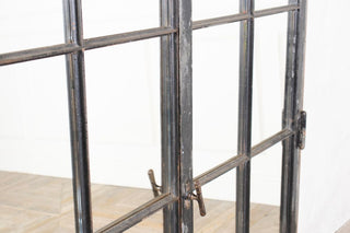 close up of cast iron mirrored window