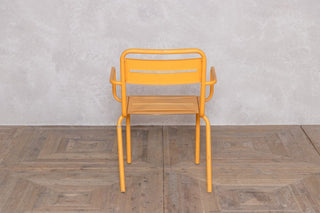 yellow-outdoor-restaurant-stacking-chair-rear
