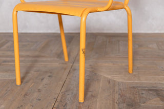 yellow-outdoor-restaurant-stacking-chair-leg