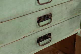 close-up-of-drawers-and-metal-handles