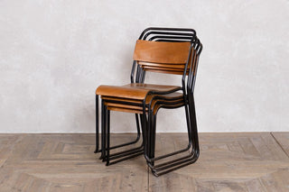 plywood stacking chairs stacked up