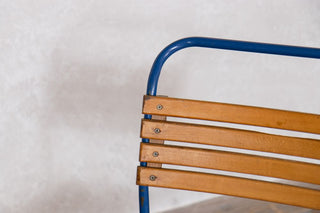 blue-slatted-restaurant-chair