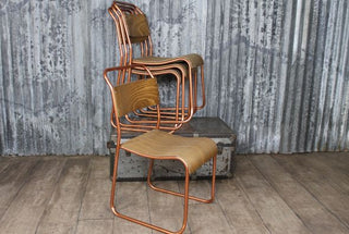 aged plywood seat stacking chair