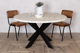 round-dining-table-with-tank-trap-base