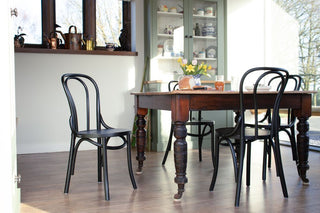 black-bentwood-around-wooden-table