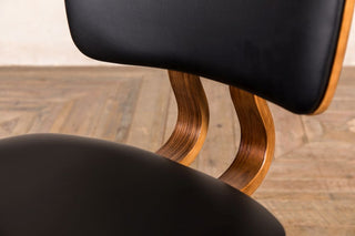 black faux leather dining chair