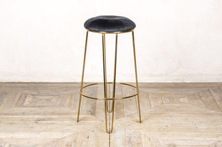 black gold legged bar stool
