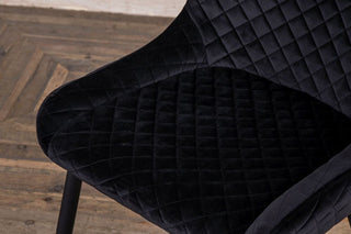 black quilted chairs