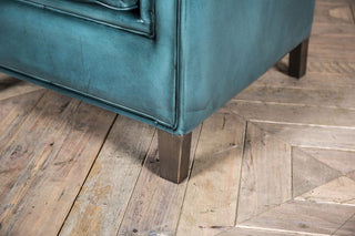 blue square leather amchair