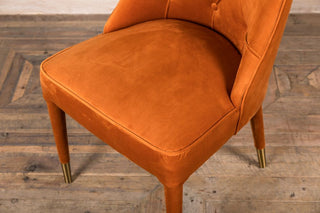 burnt orange pisa chair