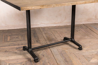 cast iron and oak table