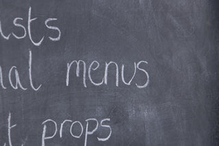 vintage-school-chalkboard-with-writing-close-up