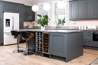 chrome and black faux leather stool