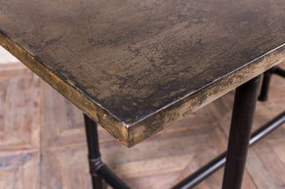 chunky pipework table with steel top