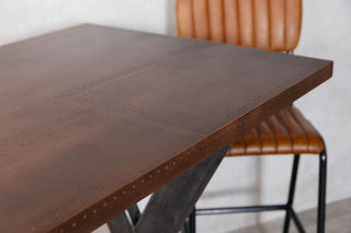 copper-top-x-frame-poseur-table-table-top-detail