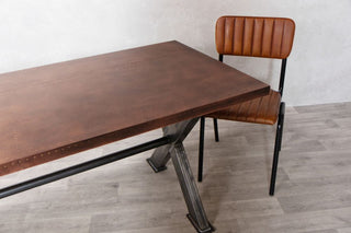 x-frame-dining-table-copper-with-chair