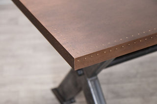 x-frame-dining-table-copper-corner