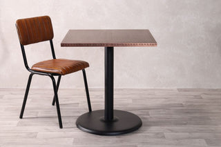 copper-table-with-large-round-base-and-arlington-chair