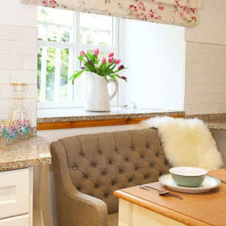 stone-bench-around-table-photo-credit-@the.farmhouse.scotland