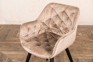 cream buttoned back dining chair