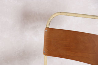 vintage plywood stacking chair close up