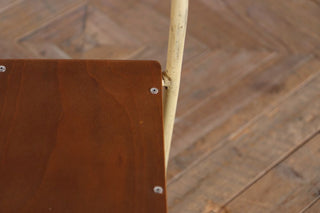 vintage plywood stacking chair close up
