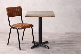 dark-pine-table-with-x-bottom-base-and-arlington-chair