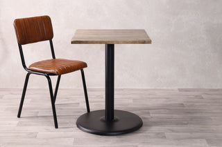 dark-pine-table-with-large-round-base-and-arlington-chair