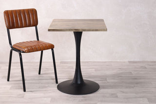 dark-pine-table-with-tulip-base-and-arlington-chair