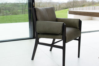 dawson-leather-dining-chair-angle-by-table