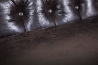 deep buttoned sofa