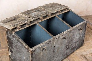 distressed metal trunk