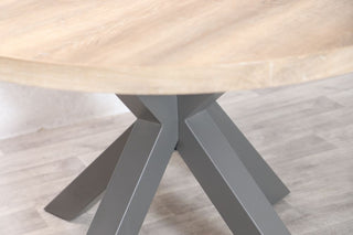 round-dining-table-with-x-base