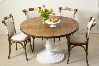 single-pedestal-round-table-lifestyle