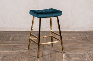 green and gold bar stool