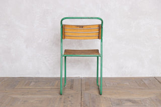green-vintage-stacking-chairs-back-view