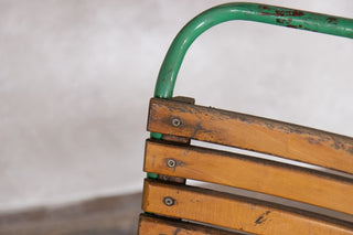 green-vintage-stacking-chairs-backrest-close-up